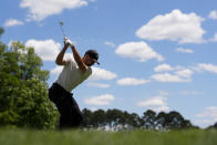 Xander Schauffele hits his tee shot on the fourth hole during the third round of the Wells Fargo Championship golf tournament at the Quail Hollow Club Saturday, May 11, 2024, in Charlotte, N.C. (AP Photo/Chris Carlson)