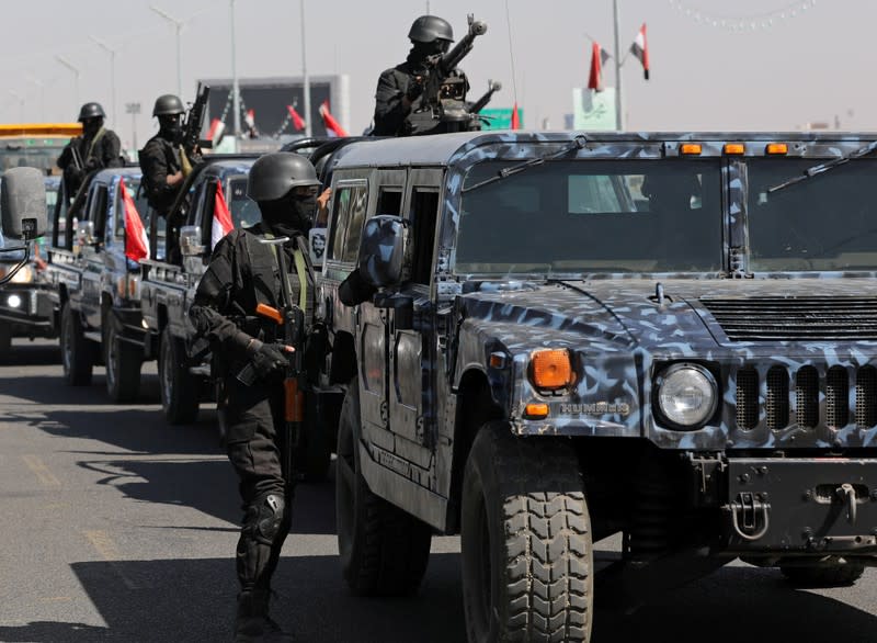 FILE PHOTO: Houthi police forces are pictured on a street in Sanaa