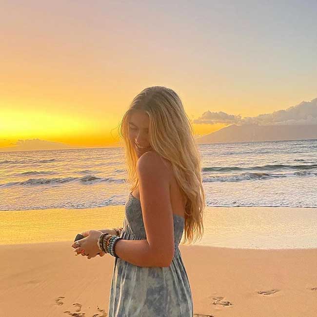 Lola Sheen on a beach at sunset