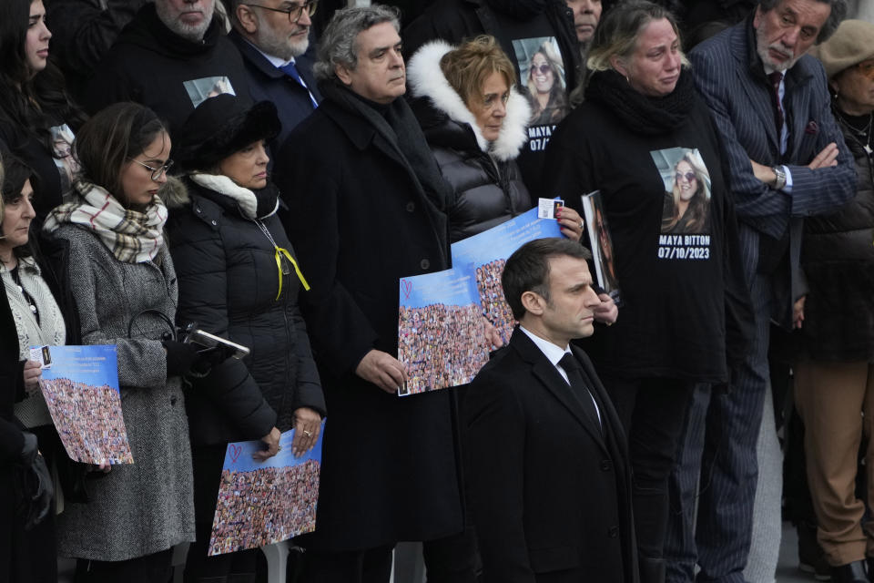 French President Emmanuel Macron attends a ceremony at the Invalides monument, Wednesday, Feb.7, 2024. France is paying tribute Wednesday to French victims of Hamas' Oct. 7 attack, in a national ceremony led by President Emmanuel Macron four months after the deadly assault in Israel that killed some 1,200 people, mostly civilians, and saw around 250 abducted. (AP Photo/Thibault Camus)