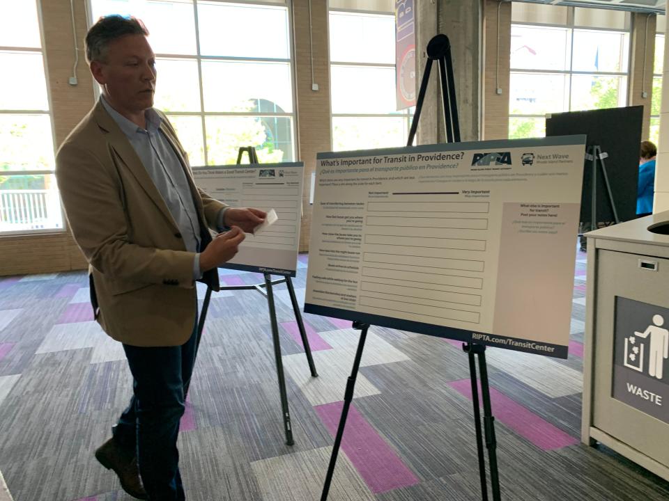 Chris Marsella, part of the development consortium looking to build a new RIPTA bus hub, explains the planning process at an outreach event Monday.
