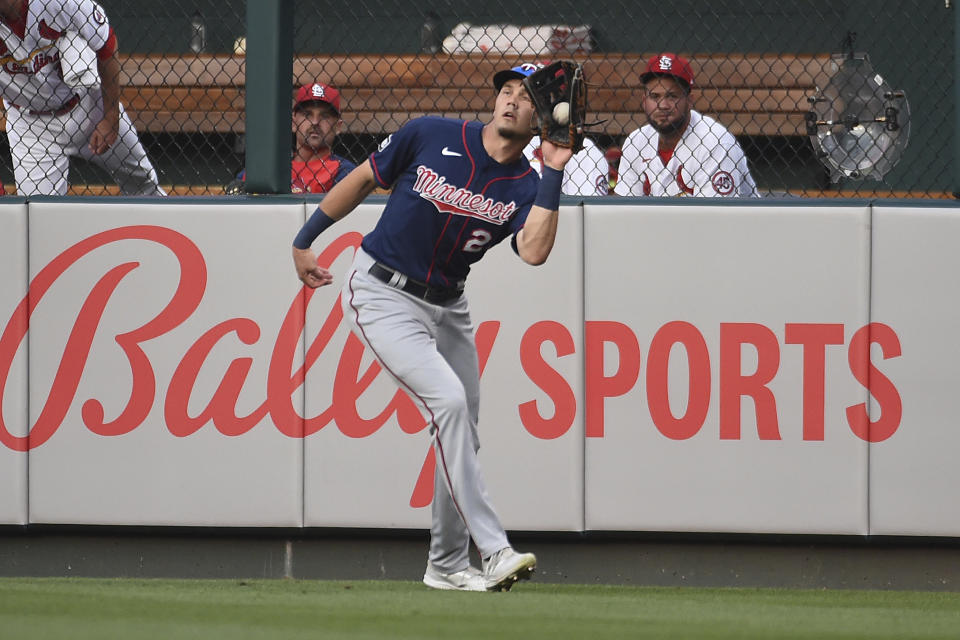 Minnesota Twins right fielder Trevor Larnach catches a fly ball hit by St. Louis Cardinals' Tyler O'Neill during the first inning of a baseball game Friday, July 30, 2021, in St. Louis. (AP Photo/Joe Puetz)