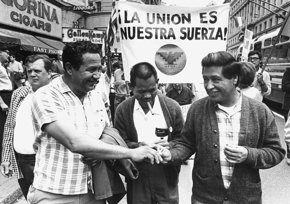 From left to right: United Farm Workers (UFW) officer Julio Hernandez, UFW director Larry Itliong, and Cesar Chavez at the 1966 Huelga Day march in San Francisco.<span class="copyright">Gerald L. French—Corbis/Getty Images</span>