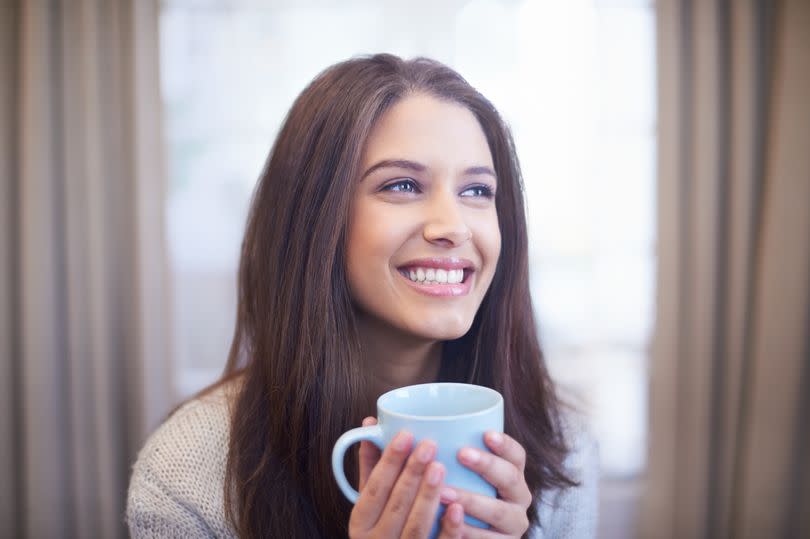 Woman with coffee cup