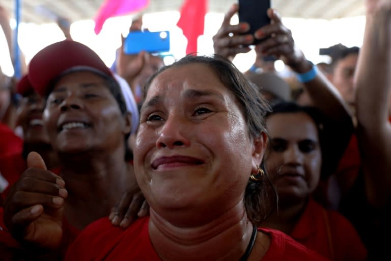 A supporter of former Brazilian president Luiz Inacio Lula da Silva gets emotional as he speaks at a rally with farmers during his three-week bus tour of northeastern Brazil