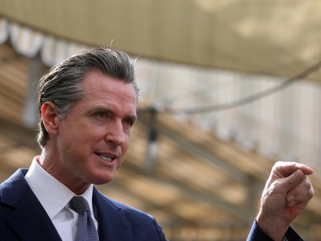 Governor Gavin Newsom speaks at a press conference on Wednesday, Feb. 9, 2022, in Oakland, Calif.