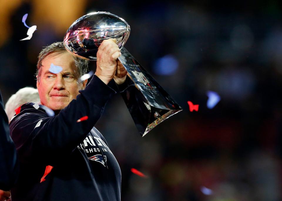 GLENDALE, AZ - FEBRUARY 01: Head coach Bill Belichick of the New England Patriots holds the Vince Lombardi Trophyafter defeating the Seattle Seahawks 28-24 during Super Bowl XLIX at University of Phoenix Stadium on February 1, 2015 in Glendale, Arizona.  (Photo by Tom Pennington/Getty Images)