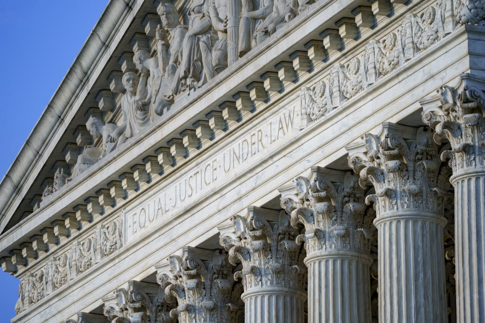 FILE - In this June 30, 2021, file photo the Supreme Court is seen in Washington. A deeply divided Supreme Court is allowing a Texas law that bans most abortions to remain in force, stripping most women of the right to an abortion in the nation’s second-largest state. The court voted 5-4 to deny an emergency appeal from abortion providers and others that sought to block enforcement of the law that went into effect Wednesday, Sept. 1. (AP Photo/J. Scott Applewhite, File)