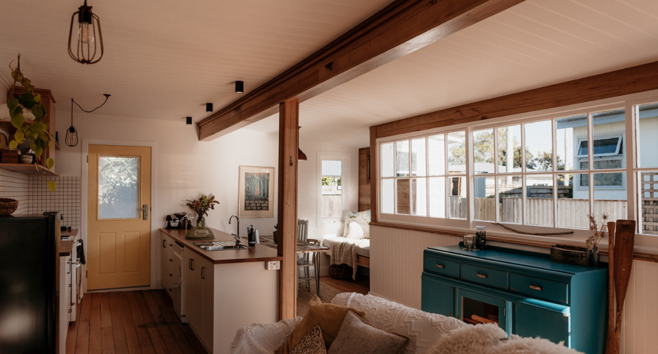 The Luttrell has been renovated with visitors in mind, a cozy lounge kitchen area with pellet heater, lots of light and sunshine. Photo: airbnb