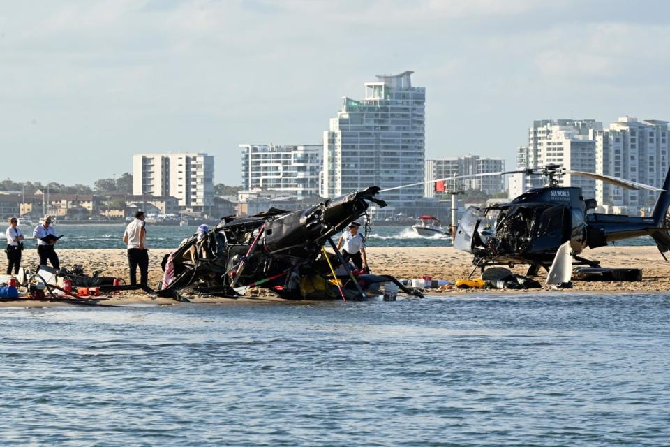 One of the helicopters appeared to have been taking off and the other landing when they collided on Main Beach on Australia’s Gold Coast last year. (AP)