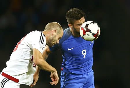 Football Soccer - Belarus v France - World Cup 2018 Qualifiers - Borisov Arena, Borisov, Belarus - 6/9/16 - Ivan Maevski of Belarus and Olivier Giroud of France in action. REUTERS/Vasily Fedosenko