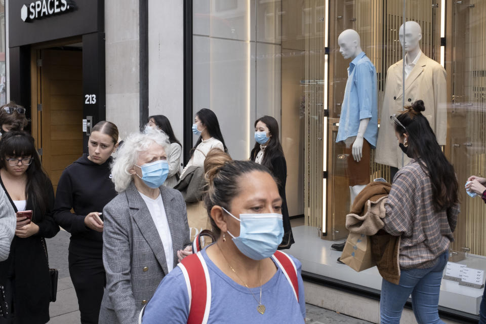 With most shops now open but with retail sales suffering due to the Coronavirus pandemic, shoppers wearing face maks, which will become compulsory in shops on the 24th July, still come to Oxford Street, London's main shopping district on 16th July 2020 in London, United Kingdom. Coronavirus or Covid-19 is a respiratory illness that has not previously been seen in humans. While much or Europe has been placed into lockdown, the UK government has put in place more stringent rules as part of their long term strategy, and in particular social distancing. (photo by Mike Kemp/In PIctures via Getty Images)