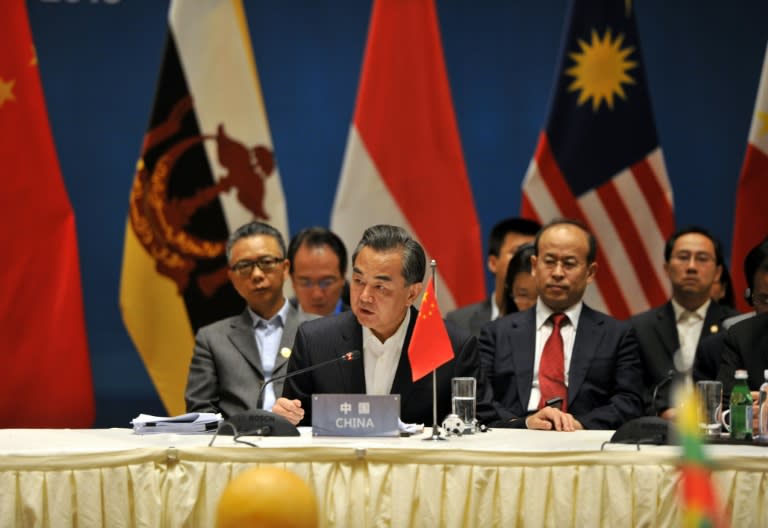 Chinese Foreign Minister Wang Yi (2nd L) and foreign ministers from ASEAN-member nations attend a special ASEAN-China foreign ministers' meeting in Yuxi, southwest China's Yunnan Province on June 14, 2016