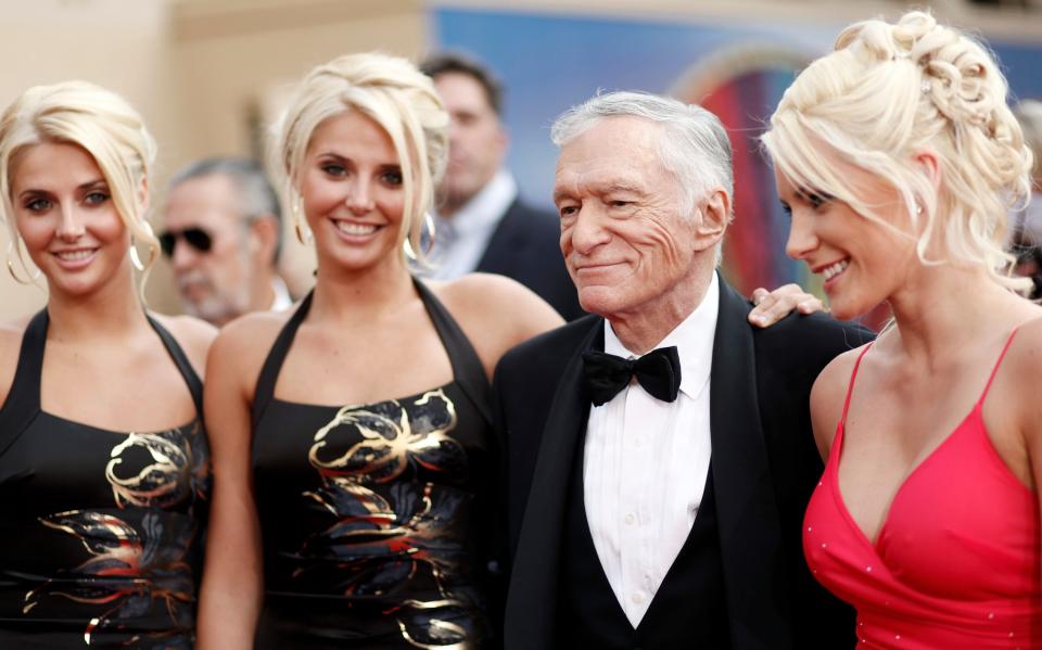 Twins Karissa and Kristina Shannon, Hugh Hefner and Crystal Harris arrive at the taping of the American Film Institute Life Achievement Awards on June 11, 2009.