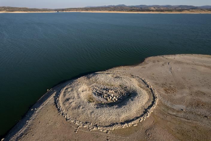 The Dolmen of Guadalperal, sometimes also known as &quot;The Spanish Stonehenge&quot; is seen above the water level at the Valdecanas reservoir, which is at 27 percent capacity, on July 28, 2022 in Caceres province, Spain.