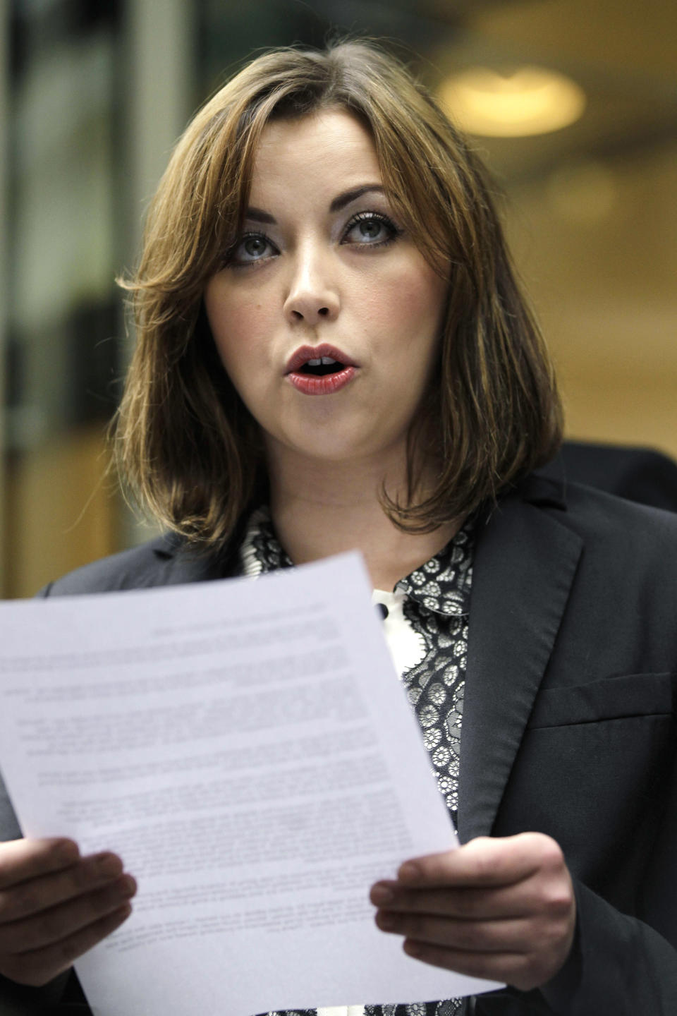 FILE- In this Feb. 27, 2012, file photo, singer Charlotte Church speaks to reporters outside the High Court in London after hearing the reading of a statement setting out the terms of the settlement for phone hacking damages claim against News International. Lord Justice Brian Leveson will release his report, Thursday Nov. 29 2012, on a year-long inquiry into the culture and practices of the British press and his recommendations for future regulation to prevent phone hacking, data theft, bribery and other abuses. (AP Photo/Sang Tan, File)