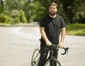 In this June 11, 2020, photo provided by Samuel Jones, his friend Zachary McCoy pauses on his bicycle in Gainesville, Fla. Local authorities considered McCoy a suspect in a house burglary because his Google location data showed he was near the house three times on the day the burglary occurred. McCoy said he rides his bike by the house regularly for exercise. Authorities were using geofence search warrants that allow law enforcement to gather data from Google on cellphone users and other devices near the scene of a crime. (Samuel Jones via AP)