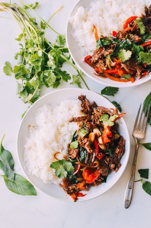 <p>The Woks of Life</p><p>Thai Basil Beef, or Pad Gra Prow, is an easy, delicious dish of stir-fried beef and thai basil. Thai Basil Beef over white rice is a perfect 15-minute meal.</p><p><strong>Get the recipe: </strong><a href="https://thewoksoflife.com/thai-basil-beef-pad-gra-prow/" rel="nofollow noopener" target="_blank" data-ylk="slk:Thai Basil Beef;elm:context_link;itc:0;sec:content-canvas" class="link rapid-noclick-resp"><strong>Thai Basil Beef</strong></a></p>