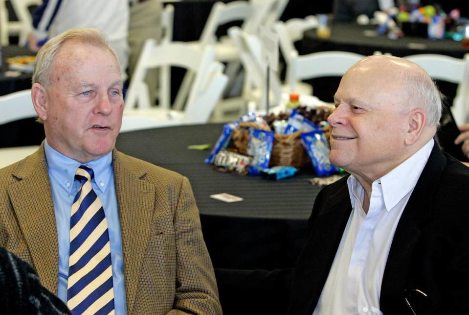 Humpy Wheeler, left, and Bruton Smith speak at a 2007 NASCAR event in Charlotte, NC. The two worked together for 35 years, helping make NASCAR the giant it is today. Smith, who died June 22, 2022, was chairman and CEO of Speedway Motorsports Inc. Wheeler was president.