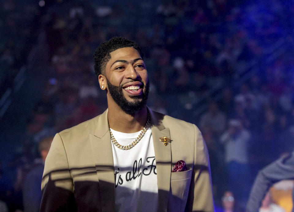 New Orleans Pelicans forward Anthony Davis (23) wears a T-shirt with 'That's All, Folks,' printed on it during player introduction before an NBA basketball game between the New Orleans Pelicans and the Golden State Warriors in New Orleans, Tuesday, April 9, 2019. (AP Photo/Scott Threlkeld)