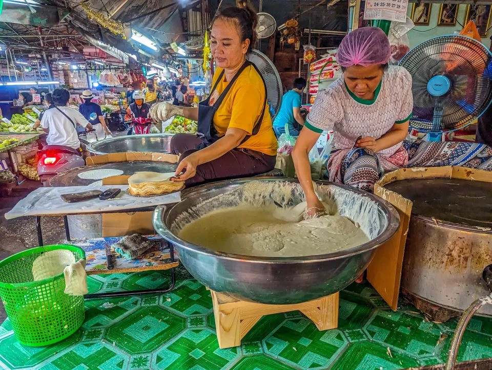 Thai women cooking together