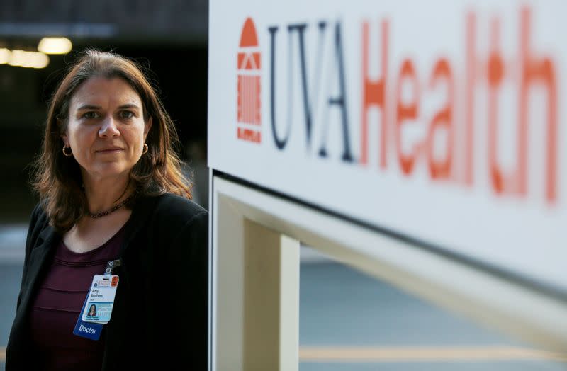 Dr. Amy Mathers stands outside the University of Virginia Medical Center in Charlottesville, Virginia