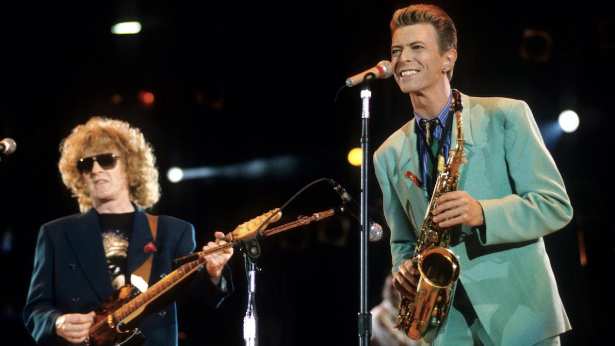  Ian Hunter and David Bowie onstage at Wembley Stadium, 1992 