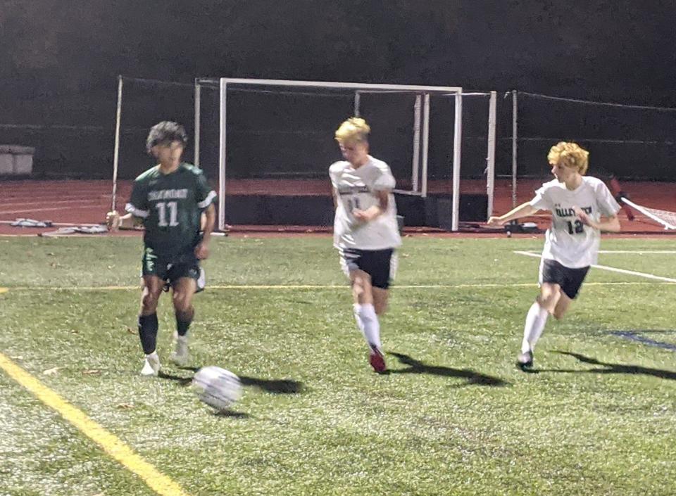 Oakmont junior striker Gael Vera (11) passes the ball back to a teammate during a CMADA Class B final against Blackstone Valley Tech at Nashoba Regional High School in Bolton.