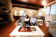 Brenda and Brian Lilly speak during an interview with The Associated Press, Thursday, Oct. 13, 2022, in Easton, Conn. Brian Lilly Jr., 19, who committed suicide on Jan. 4, 2021, was a rower at University of California San Diego. The Lillys have filed a wrongful death lawsuit against the university and the rowing coach, Geoff Bond, who is no longer with the school. (AP Photo/Julia Nikhinson)