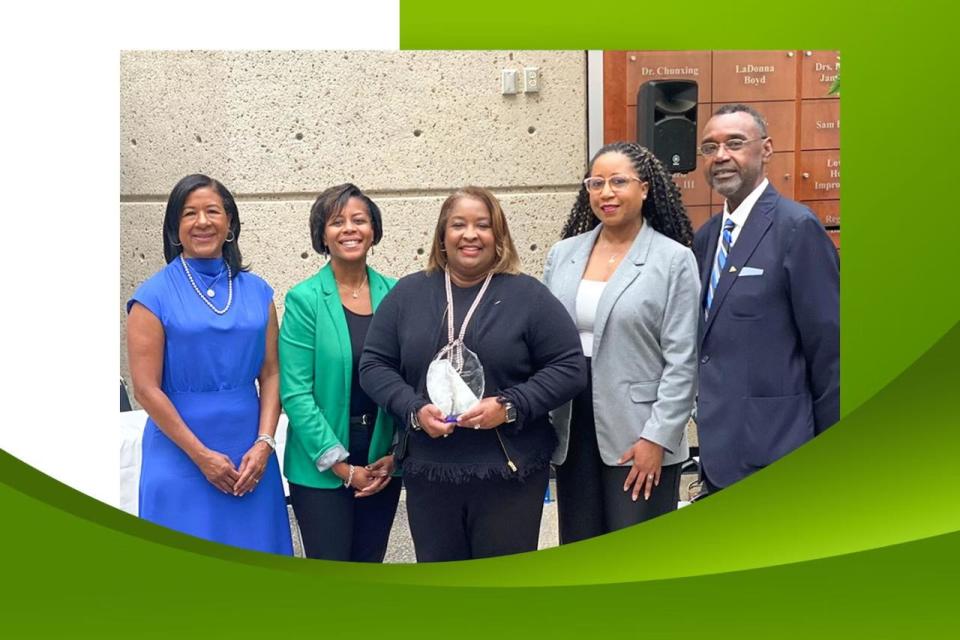 Latrisha Jemison (center) celebrates her Corporate Engagement Award from Tennessee State University with Regions colleagues Lethia Mann, Dana Williams, LaQuan Jackson and Dennie Marshall.