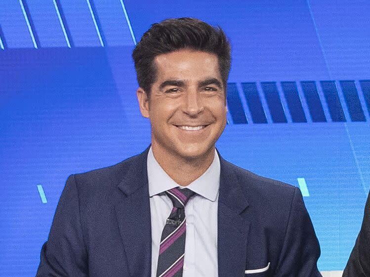 FILE - Jesse Watters appears on Fox News "The Five" in New York on Oct. 10, 2019. Watters will host an opinion show in the time slot formerly occupied by Tucker Carlson, Fox News Channel announced Monday. He will remain a co-host on "The Five," an evening roundtable discussion show that is hugely popular on the network. (AP Photo/Mary Altaffer, File)