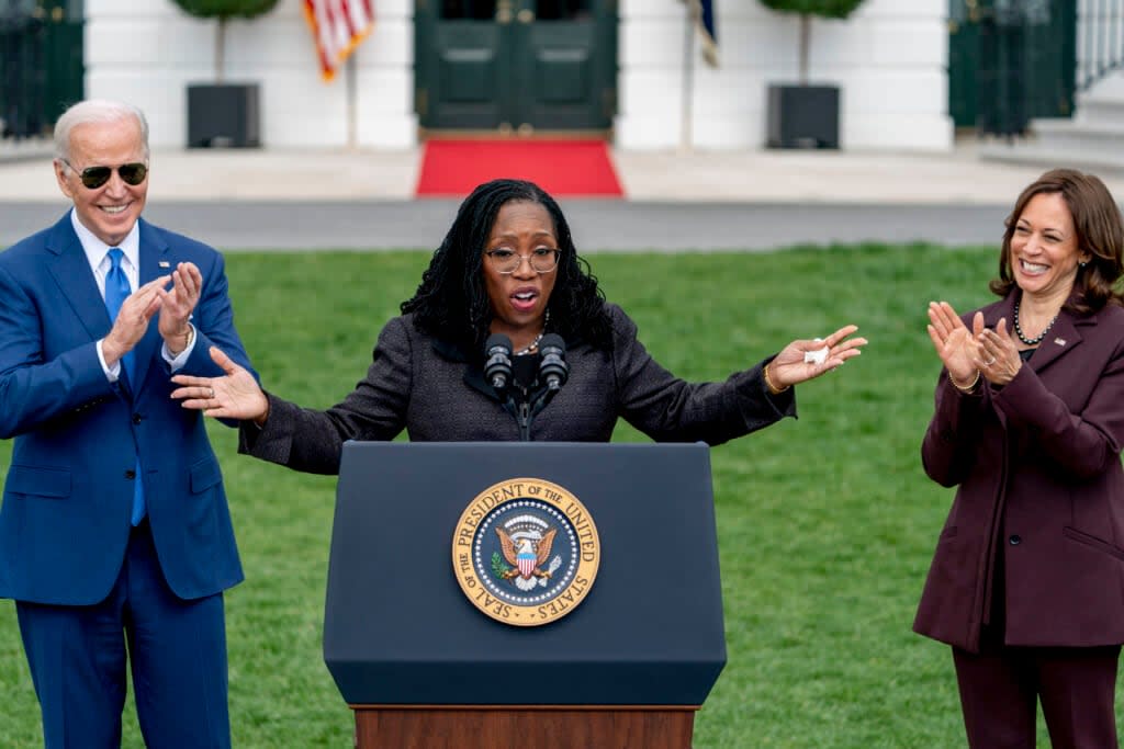 Judge Ketanji Brown Jackson, accompanied by President Joe Biden, and Vice President Kamala Harris, speaks during an event on the South Lawn of the White House in Washington, Friday, April 8, 2022, celebrating the confirmation of Jackson as the first Black woman to reach the Supreme Court. (AP Photo/Andrew Harnik)