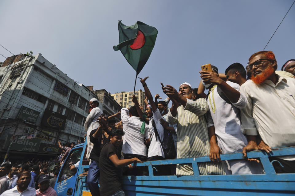 Activists of the Bangladesh Nationalist Party gather for a protest in Dhaka, Bangladesh, Saturday, Oct. 28, 2023. Police in Bangladesh's capital fired tear gas to disperse supporters of the main opposition party who threw stones at security officials during a rally demanding the resignation of Prime Minister Sheikh Hasina and the transfer of power to a non-partisan caretaker government to oversee general elections next year. (AP Photo/Mahmud Hossain Opu)