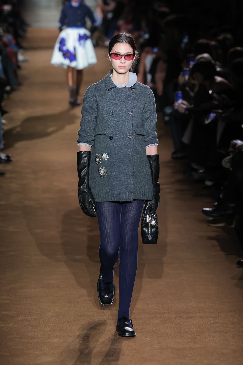 paris, france march 05 editorial use only for non editorial use please seek approval from fashion house a model walks the runway during the miu miu womenswear fallwinter 2024 2025 show as part of paris fashion week on march 05, 2024 in paris, france photo by victor boykogetty images