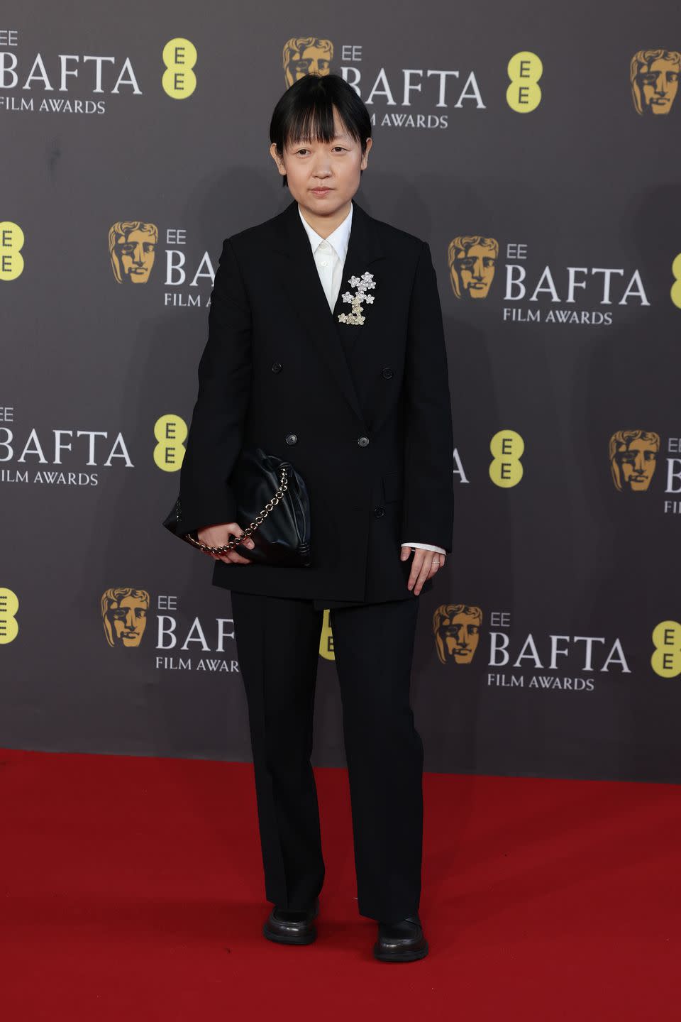 london, england february 18 celine song attends the 2024 ee bafta film awards at the royal festival hall on february 18, 2024 in london, england photo by neil mockfordfilmmagic