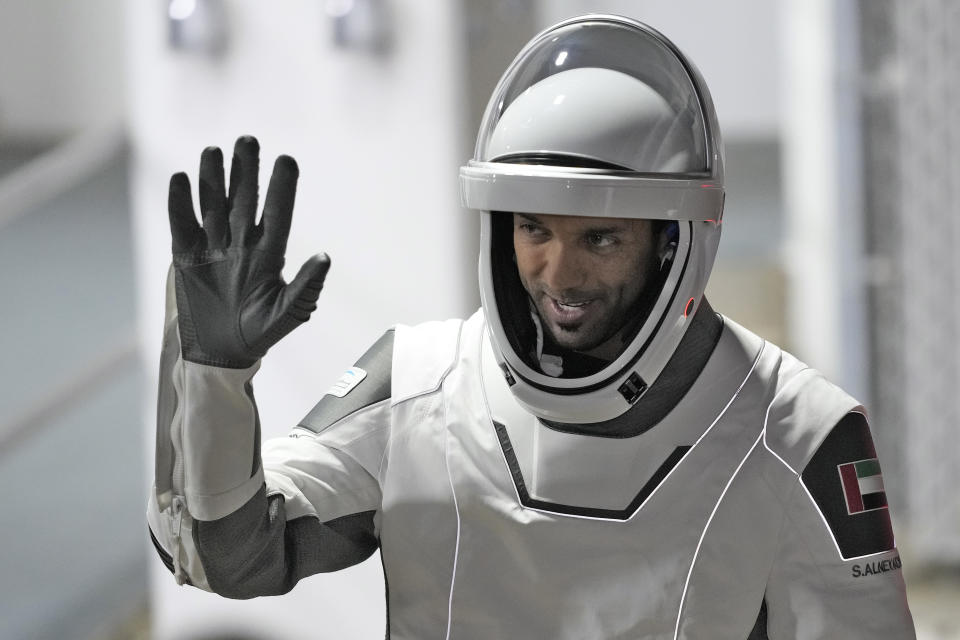 United Arab Emirates astronaut Sultan al-Neyadi waves to family members after leaving the Operations and Checkout building for a trip to Launch Pad 39-A, Wednesday, March 1, 2023, at the Kennedy Space Center in Cape Canaveral, Fla. Four astronauts are scheduled to liftoff early Thursday morning on a trip to the International Space Station. (AP Photo/John Raoux)