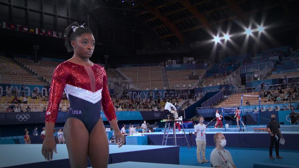 In a scene from the documentary series, Simone Biles can be seen competing.