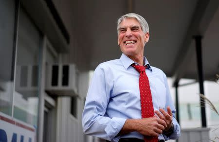 U.S. Senator Mark Udall (D-CO) campaigns at a pre-debate rally in Denver in this October 15, 2014 file photo. REUTERS/Rick Wilking/Files