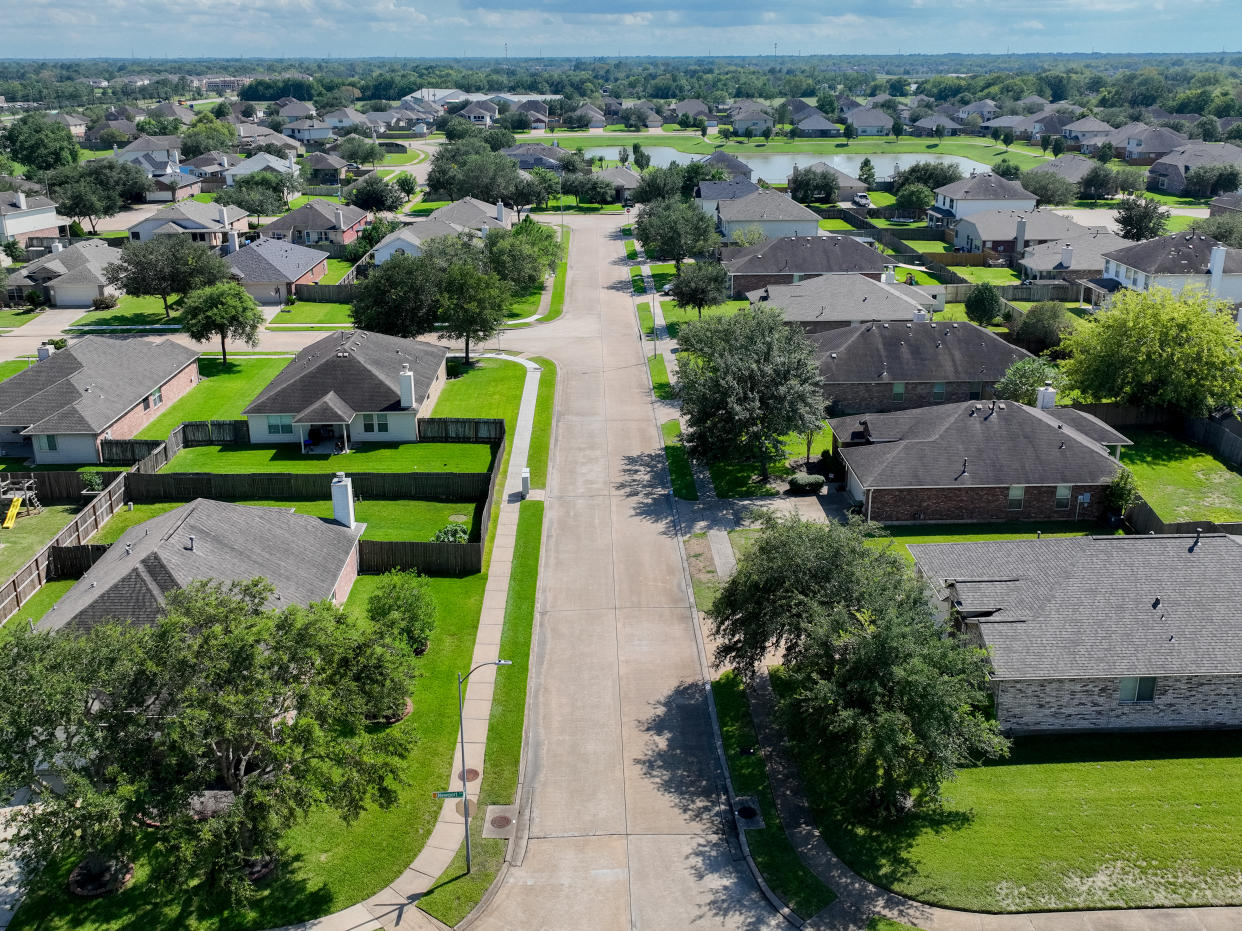 HOUSTON, TEXAS - SEPTEMBER 15: In an aerial view, homes are seen in a residential neighborhood on September 15, 2022 in Pearland, Texas. Mortgage rates continue climbing around the country as the housing market reached 6% this week, marking the first time since the 2008 financial crisis. (Photo by Brandon Bell/Getty Images)