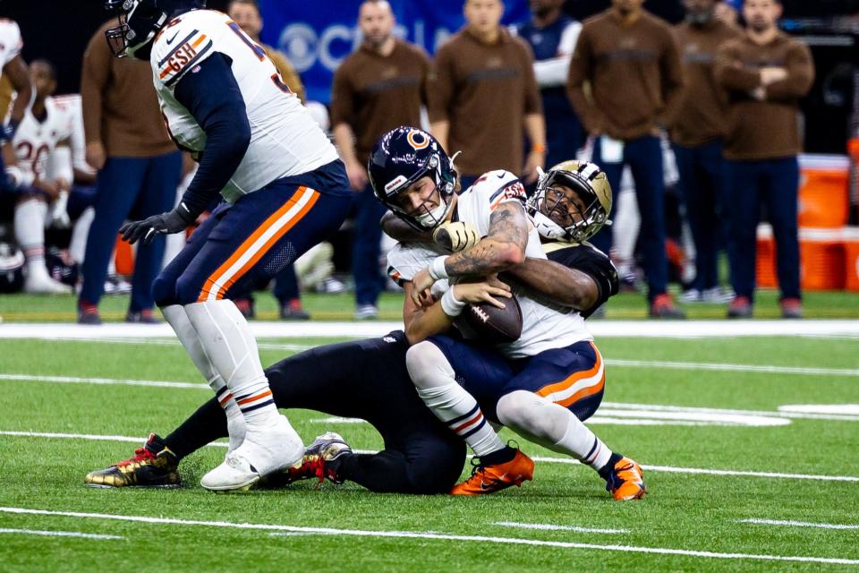 New Orleans Saints defensive end Cameron Jordan (94) sacks Chicago Bears quarterback Tyson Bagent (17) during the first half at the Caesars Superdome.