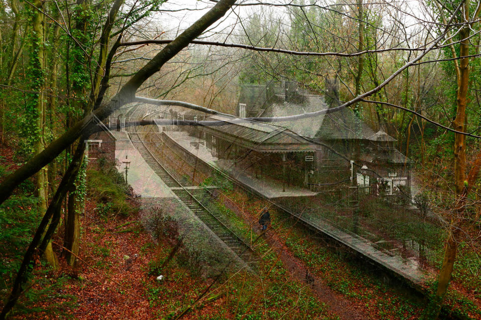 A ghostly composite combining old scenes with new shows a dog walker strolling along a footpath between the platforms of the shut-down former train station at West Meon in Hampshire.