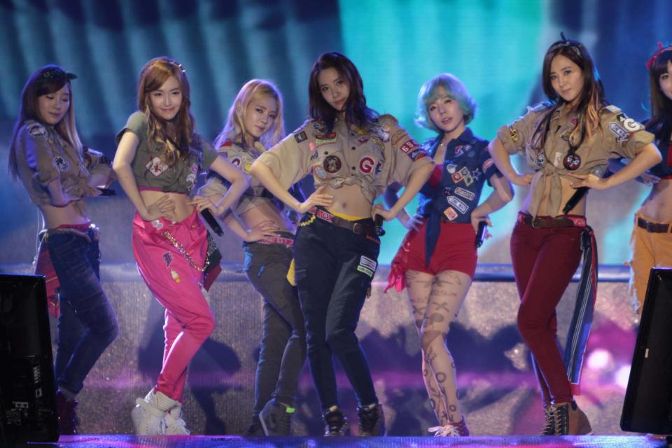 Kpop group "Girls Generation" performs for the crowd during the "Dream Kpop Fantasy Concert" held at the Mall of Asia grounds in Pasay city, south of Manila on 19 January 2013.