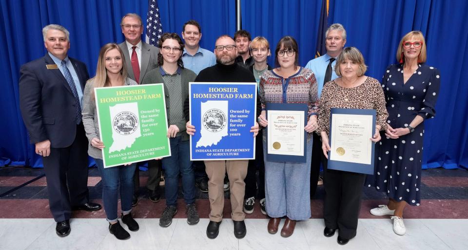 Members of the Connie (Jordan) Sands family attended the ceremony and are pictured alongside state officials. Those pictured include, front row, from left: Megan Langley, Gannon Holsapple, Kelby Holsapple, Kindra Holsapple and Connie (Jordan) Sands. Back row: Director Bruce Kettler, State Representative Bob Heaton, Keaton Langley, Sterling Langley, Ian Holsapple, Jeff Sands and Lt. Gov. Suzanne Crouch