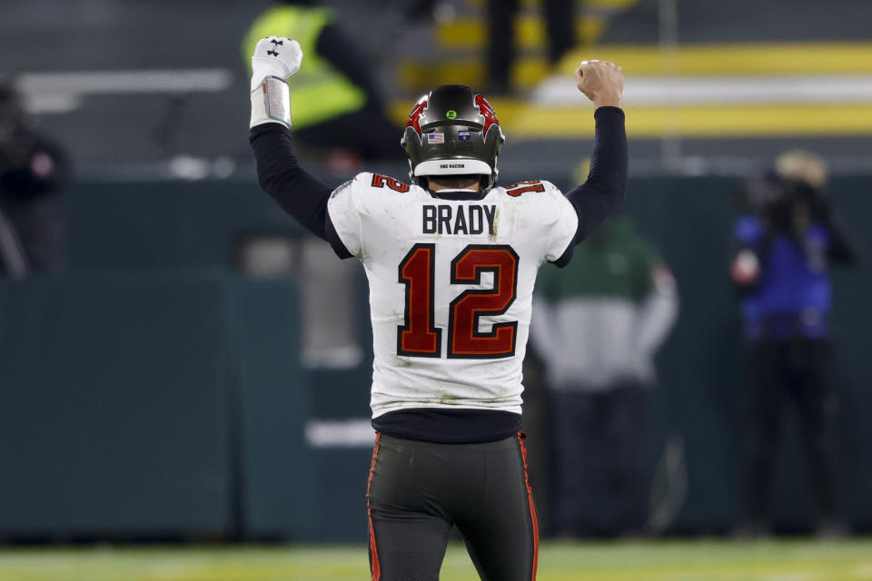 Tampa Bay Buccaneers quarterback Tom Brady reacts after winning the NFC championship NFL football game against the Green Bay Packers in Green Bay, Wis., Sunday, Jan. 24, 2021. The Buccaneers defeated the Packers 31-26 to advance to the Super Bowl. (AP Photo/Jeffrey Phelps)