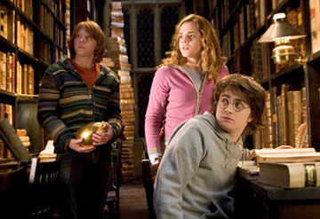 <p>Rupert Grint as Ron Weasley, Emma Watson as Hermione Granger and Daniel Radcliffe as Harry Potter in Warner Bros. Pictures' Harry Potter and the Goblet of Fire - 2005</p>