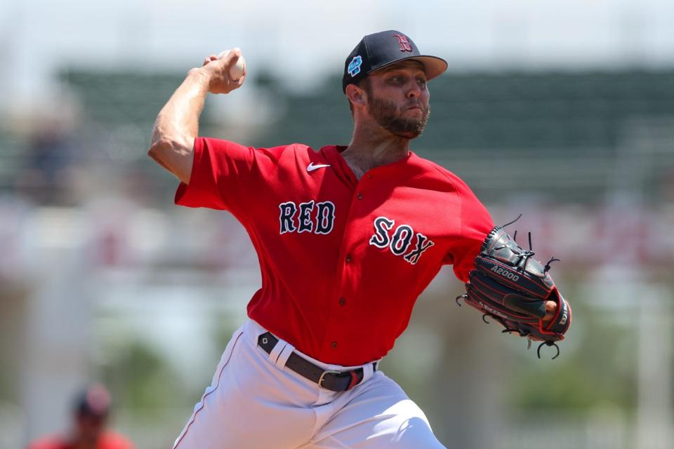 Boston Red Sox starting pitcher Kutter Crawford throws a pitch against the Atlanta Braves in the first inning during spring training at JetBlue Park at Fenway South on March 28, 2023.