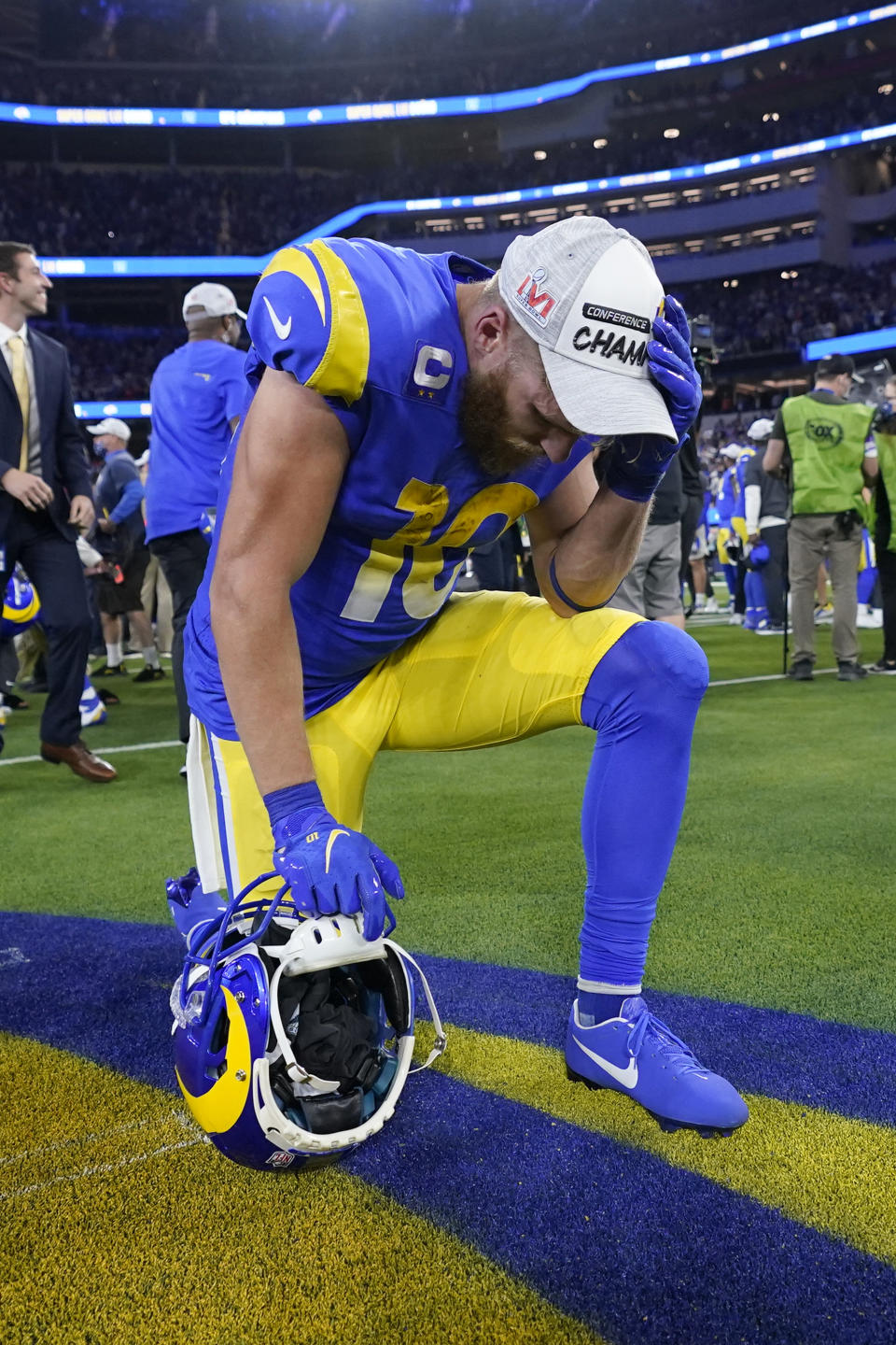 Los Angeles Rams' Cooper Kupp pauses after the NFC Championship NFL football game against the San Francisco 49ers Sunday, Jan. 30, 2022, in Inglewood, Calif. The Rams won 20-17 to advance to the Super Bowl. (AP Photo/Marcio Jose Sanchez)