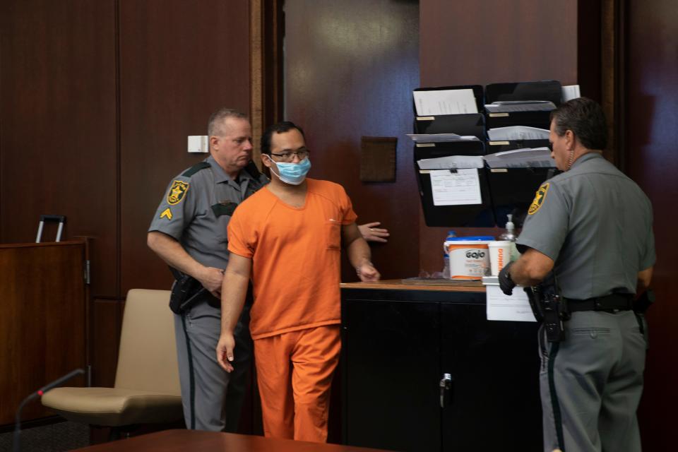 Hector Manley walks into the courtroom for his fingerprints, Friday, Jan. 21, 2022, at Collier County Courthouse.Manley, a former teacher at Parkside Elementary School, was found guilty on 20 counts of lewd lascivious molestation of a child under 12.