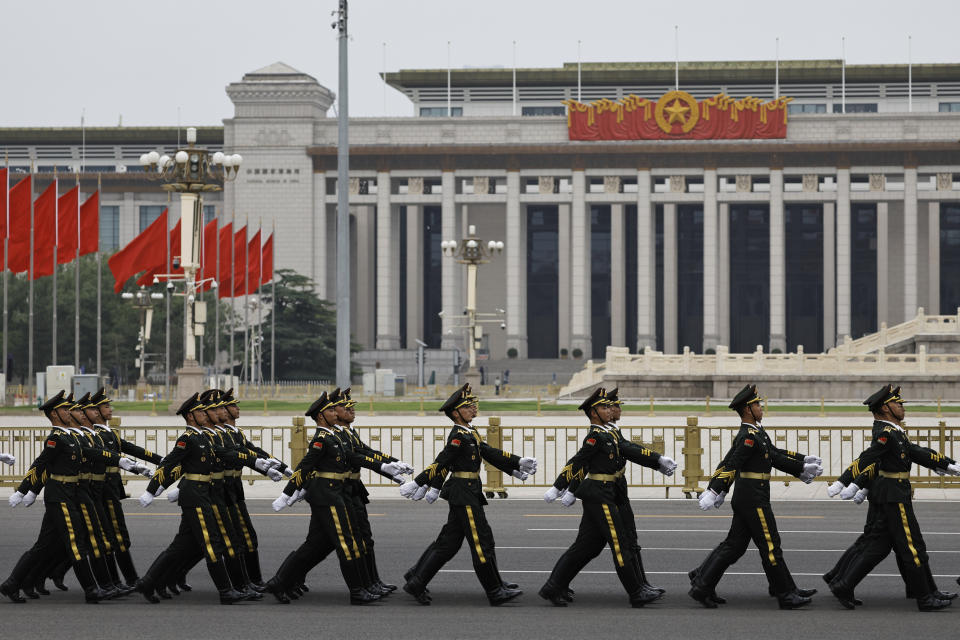 Honour guard members march past Tiananmen Square before a welcome ceremony for Egyptian President Abdel Fattah al-Sisi at the Great Hall of the People in Bejing, Wednesday, May 29, 2024. (Tingshu Wang, Pool Photo via AP)