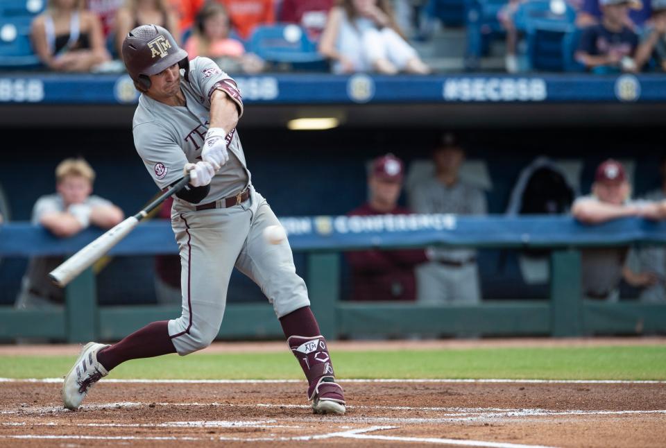 Texas A&M outfielder Dylan Rock (27) swings at the ball as Alabama Crimson Tide takes on Texas A&M Aggies during the SEC baseball tournament at the Hoover Metropolitan Stadium in Hoover, Ala., on Friday, May 27, 2022.
